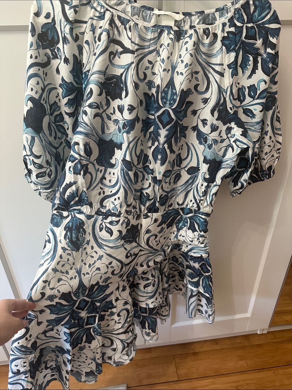 Women's White Tunic with Blue Floral Print and Peplum Hem